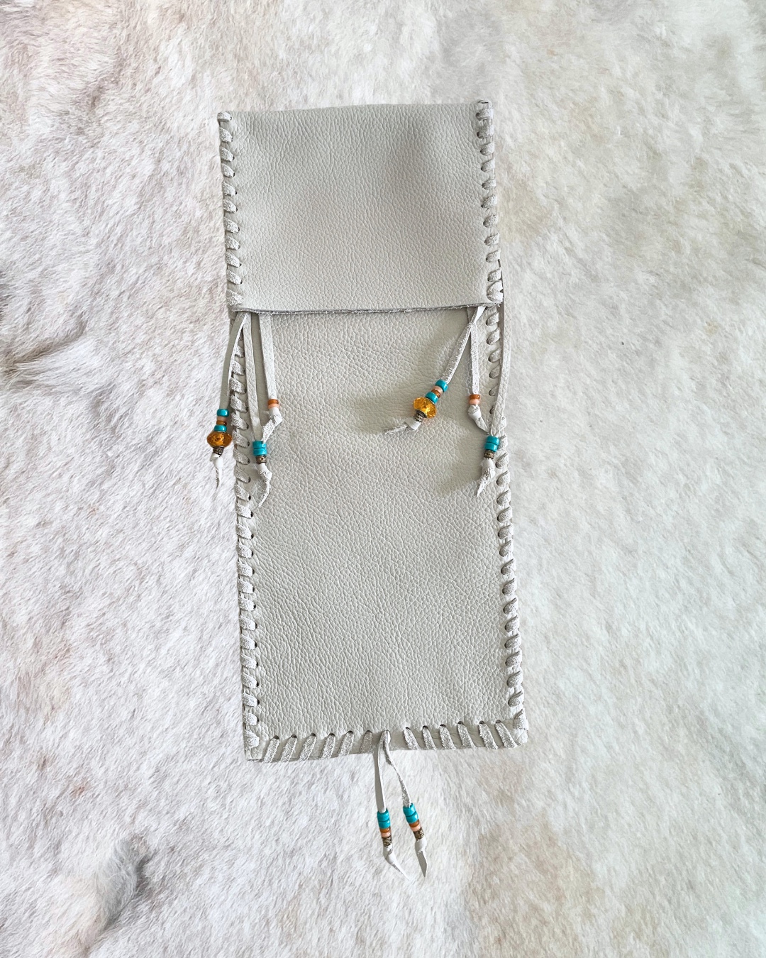 funda alicia para maracas y joyas sonoras 1548xx030 deblanc | hecha a mano con cuero viejo